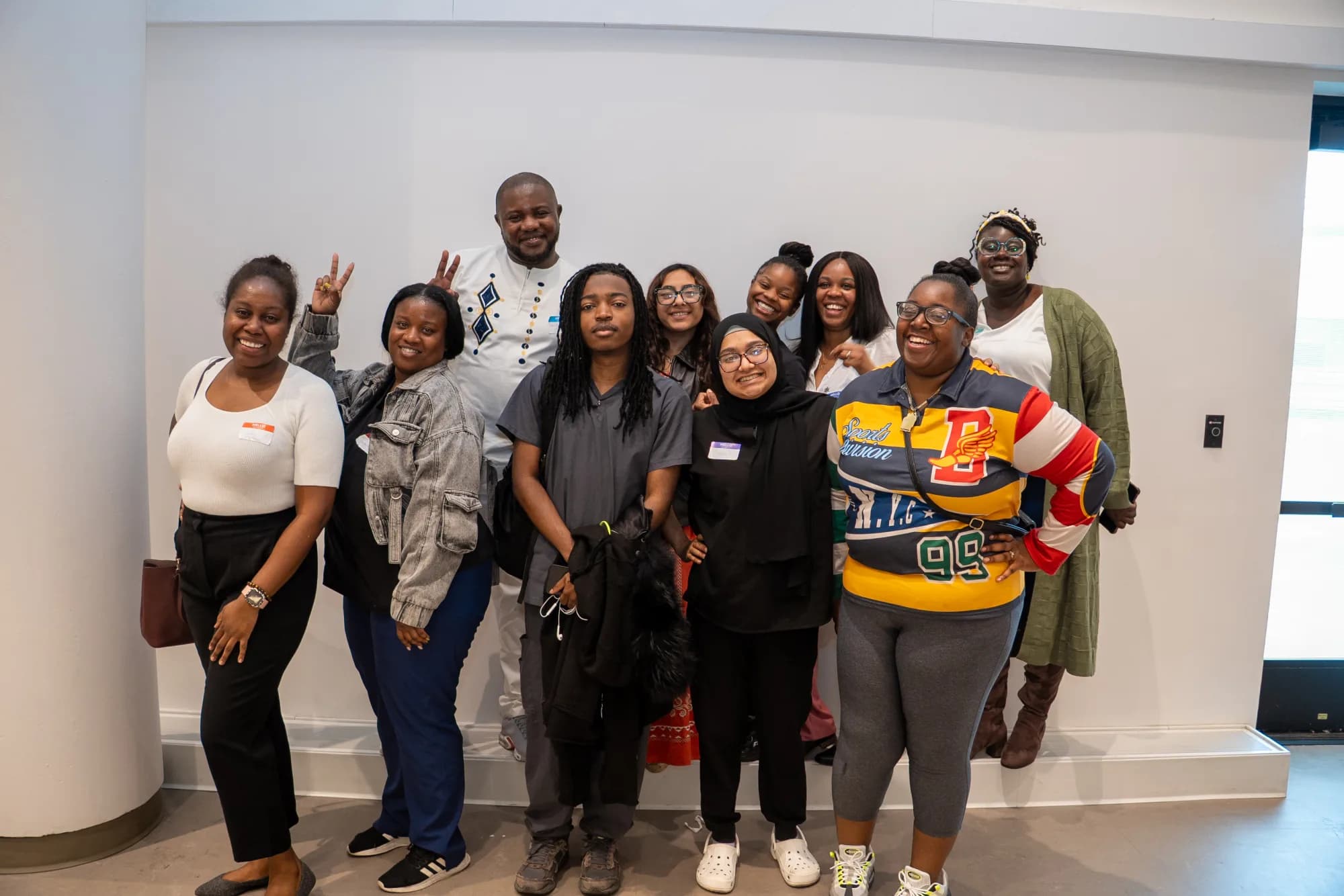 Uplift students and staff smiling together after a workforce program session